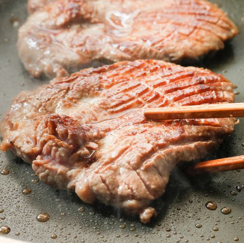 Thickly sliced grilled beef tongue
