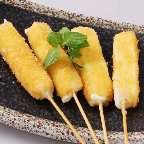 Fried mozzarella cheese skewers