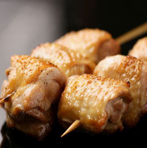 Grilled Hinai chicken thigh skewers