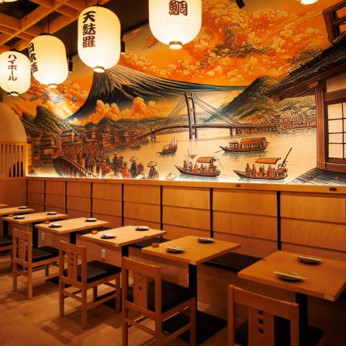 当店の2名席テーブルは、ゆったりとくつろげる落ち着いた空間。デートやご友人とのお食事にぴったりのプライベート感ある席で、美味しい料理とお酒をお楽しみいただけます。自慢の串焼きや旬の逸品料理を味わいながら、会話も弾む心地よいひとときをお過ごしください。