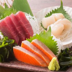 Assortment of three types of fresh fish sashimi