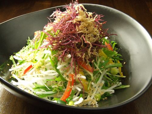 Japanese-style salad with fried sardines and mizuna