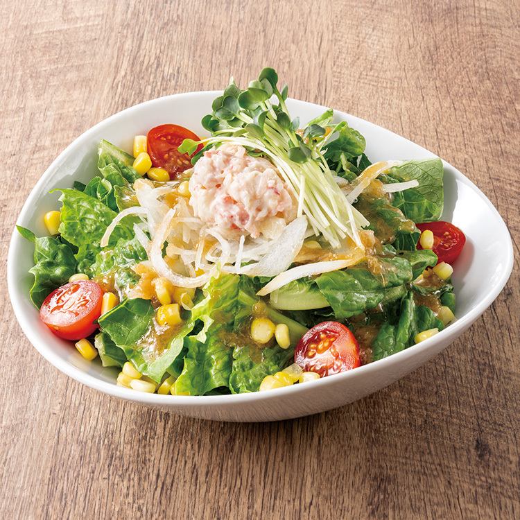 A heart-warming salad of colorful vegetables and organic ginger dressing