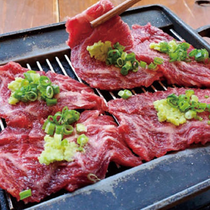 Awaji Wagyu beef rib loin grilled on an iron plate with wasabi