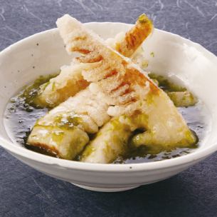 Deep-fried bamboo shoots with aonori (seaweed) sauce.