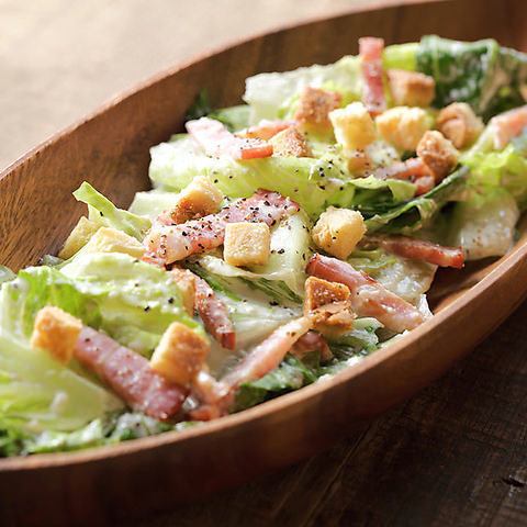 Warm Caesar salad with lots of vegetables