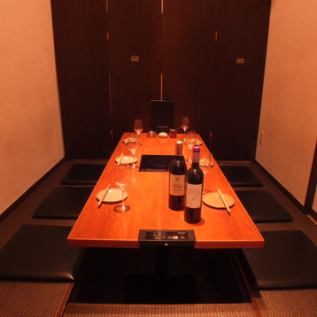 A private room with sunken kotatsu seating for six.