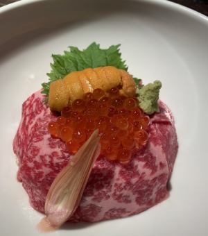 Ozaki beef pickled rice bowl topped with sea urchin and salmon roe