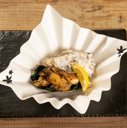 Butter-grilled oysters and spinach
