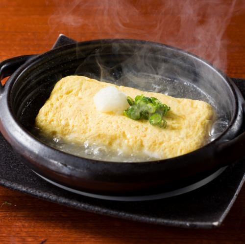 Omelet flavored with flying fish stock