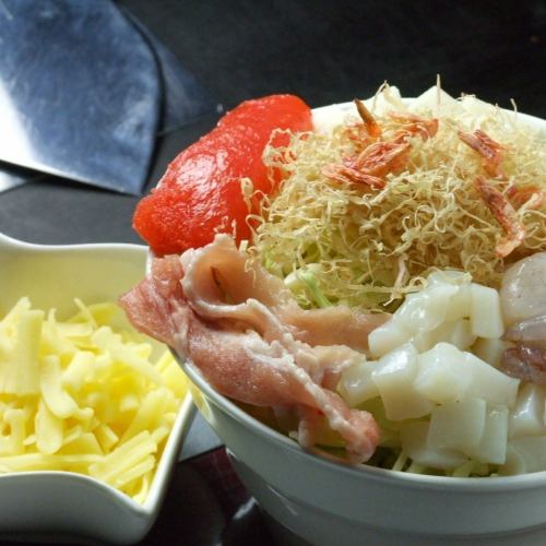 Three star monja (raw squid, raw shrimp, scallop, mentaiko, pork, mochi, cheese)