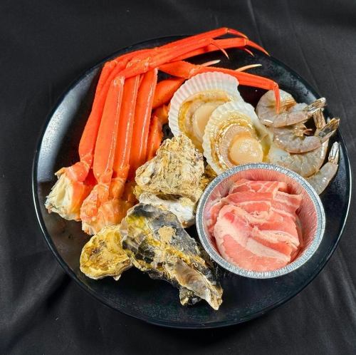 カニ・牡蠣・帆立が並ぶ「豪華海鮮ワンプレート」付き