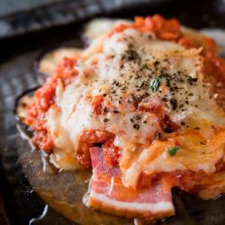 Eggplant and tomato baked with cheese