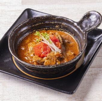 Chita beef stewed in tomato sauce