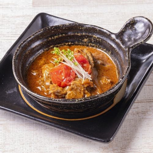 Chita beef stewed in tomato sauce
