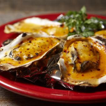 Grilled Oyster with Sea Urchin (3 pieces)