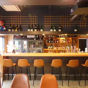 Our bar boasts a long counter with 10 seats, offering the ultimate bar experience with a wide selection of famous sake and premium shochu! It's a popular spot for a luxurious all-you-can-drink experience for solo diners or a quick drink after work. With its relaxed yet homey and unpretentious atmosphere, even bar beginners are welcome to drop by!