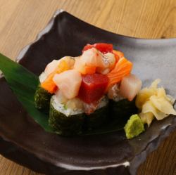 Sushi topped with seafood
