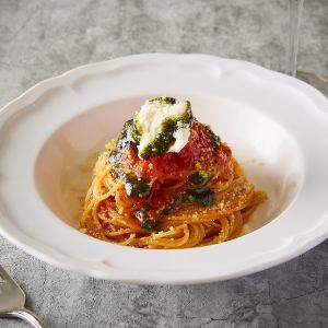 Fruit tomatoes and basil in Beppe-style tomato sauce