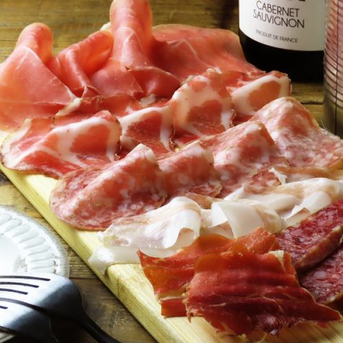 Assorted raw ham and salami