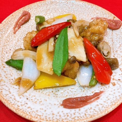 Conger eel stir-fried with plum and oyster sauce