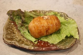 Homemade meat-wrapped rice ball