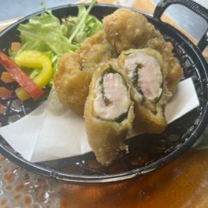 Deep fried chicken breast with plum and perilla leaves