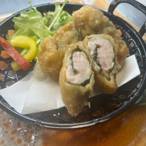 Deep fried chicken breast with plum and perilla leaves