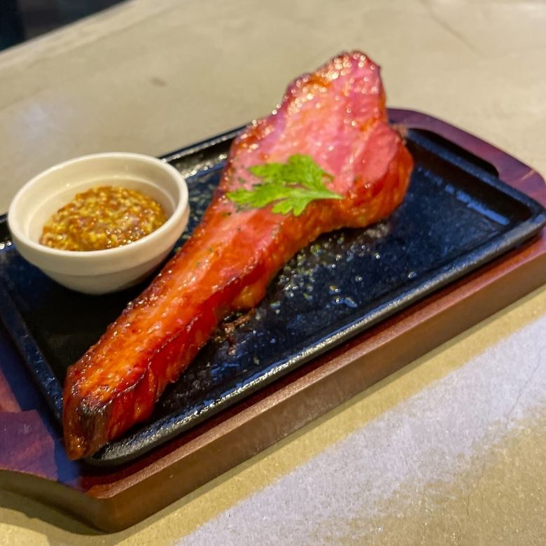 Bacon steak on a hot plate