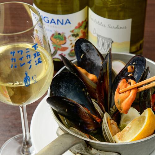 豪華絢爛！貝の山盛り白イン蒸しは華やかな看板メニュー