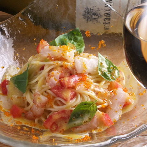 Cold pasta with red shrimp, basil and fresh tomatoes