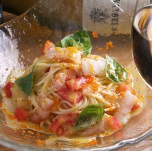 Cold pasta with red shrimp, basil, and fresh tomatoes