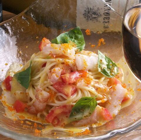 Cold pasta with red shrimp, basil, and fresh tomatoes