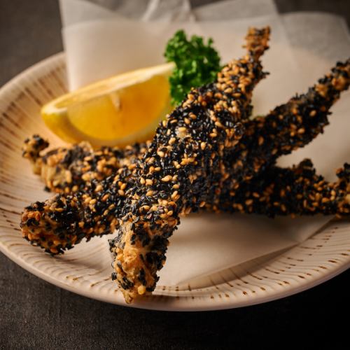 A little adult fried shishamo with sesame seeds