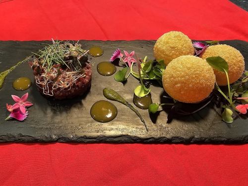 Hokkaido beef tartare with sea urchin sauce and Manganji pepper puree