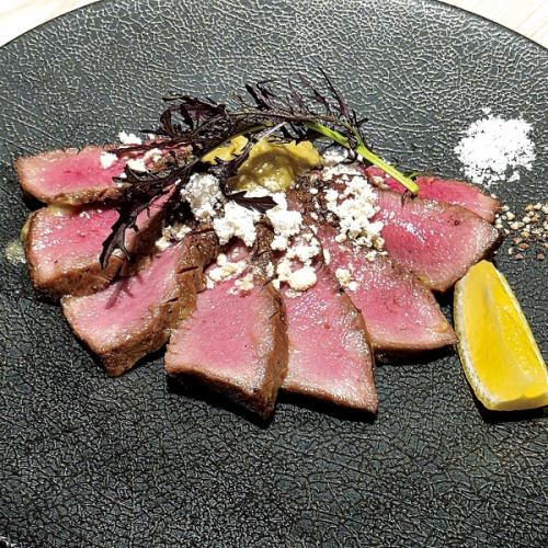 Charcoal-grilled beef tongue with scallion puree and sesame oil aroma.
