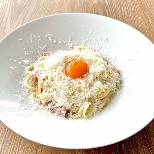 Rich cheese carbonara with extra rich egg
