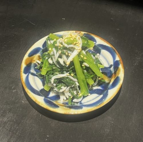 Whitebait and chrysanthemum greens with olive dressing