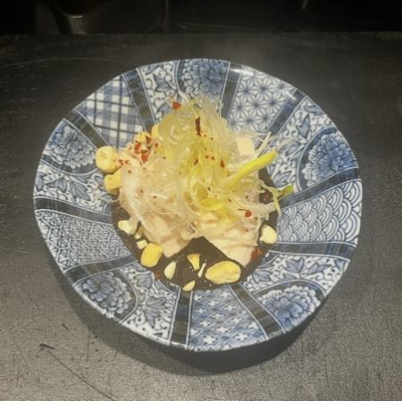 Moist chicken with black sesame sauce