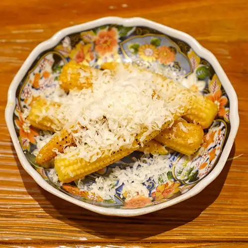 Roasted baby corn with Parmesan cheese