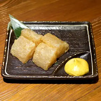 Deep-fried daikon radish that has absorbed the flavors.