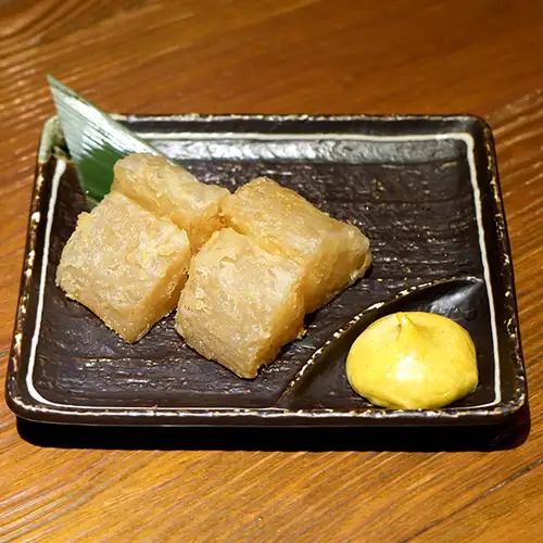 Deep-fried daikon radish that has absorbed the flavors.