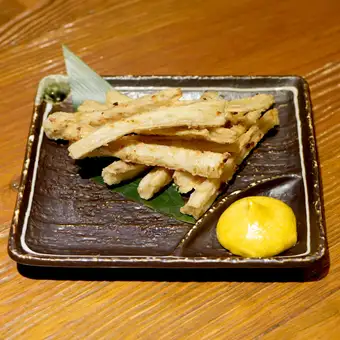 Deep-fried burdock root with curry mayonnaise.