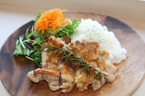 Adults' most popular dish: Herb Chicken Confit, served with bread, salad buffet, and drink bar.