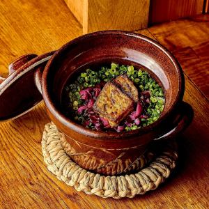 Truffle-scented foie gras rice cooked in an earthenware pot