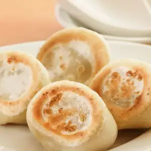 鲜嫩多汁、热气腾腾的煎饺