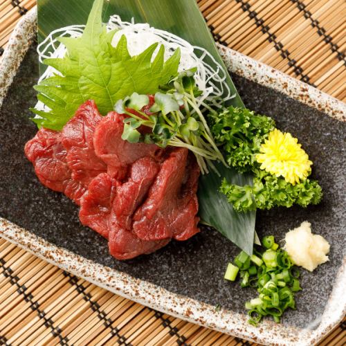 Assortment of 3/4 types of horse sashimi (kalbi, skirt steak, tongue, misuji)