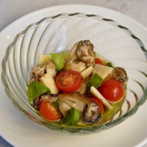 Oysters in oil and Parmesan Caprese