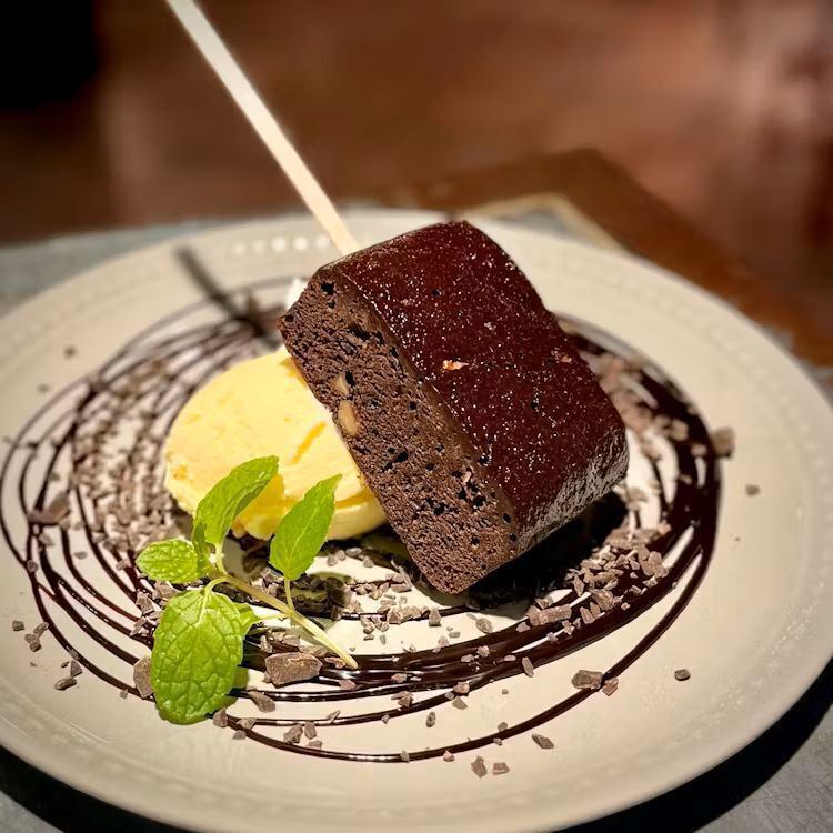 Warm chocolate brownie and vanilla ice cream