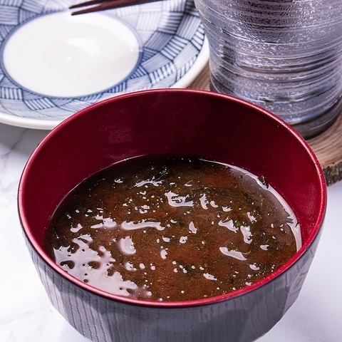 Miso soup with green seaweed
